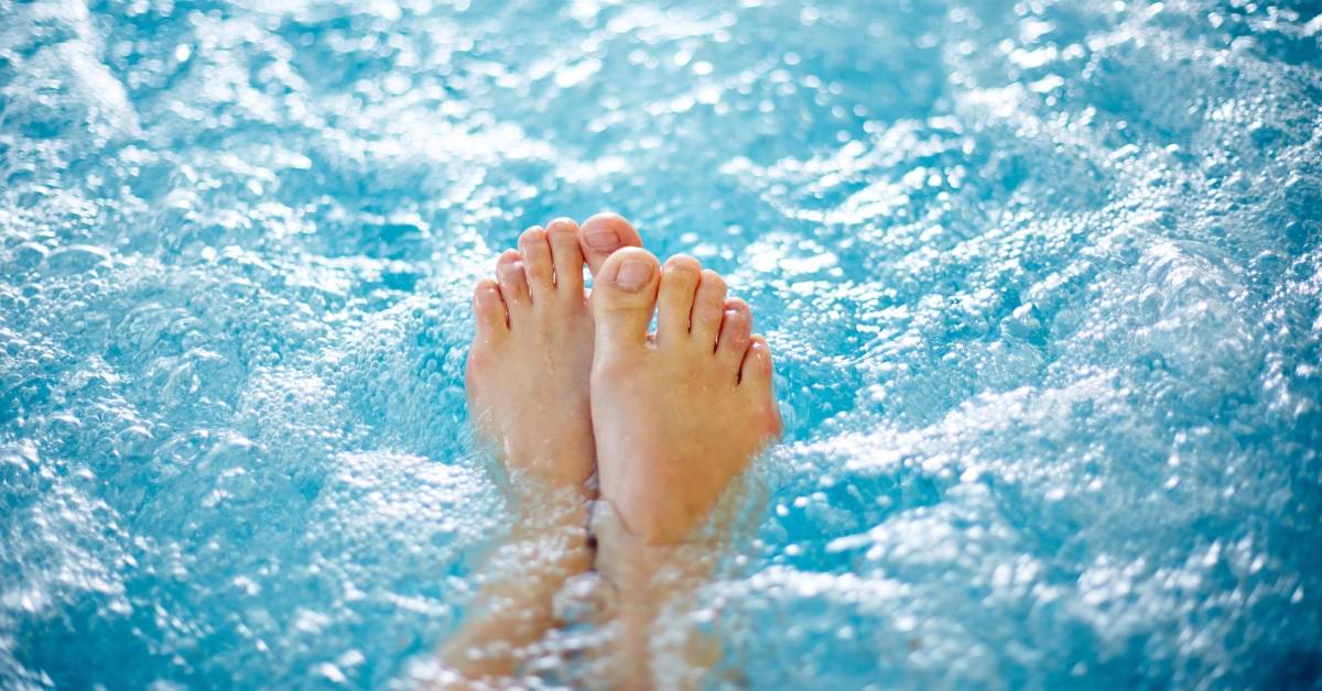enjoying a soak in a hot tub