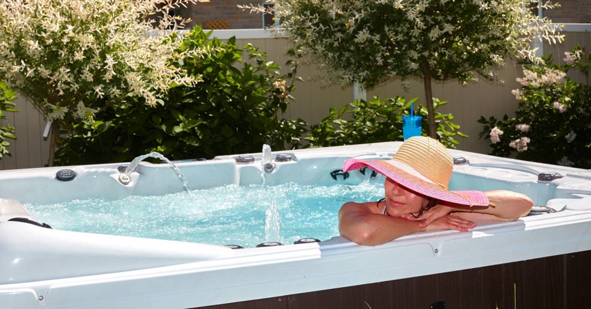 Woman lounging in a hot tub
