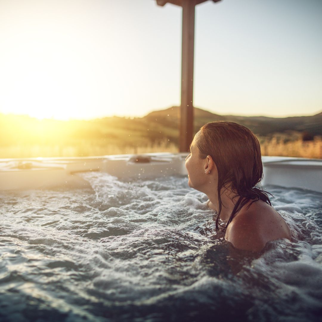 woman relaxing in a hot tub