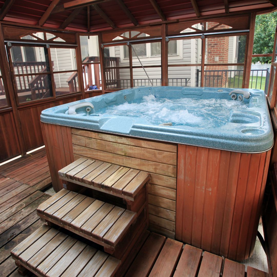 outdoor hot tub under a gazebo