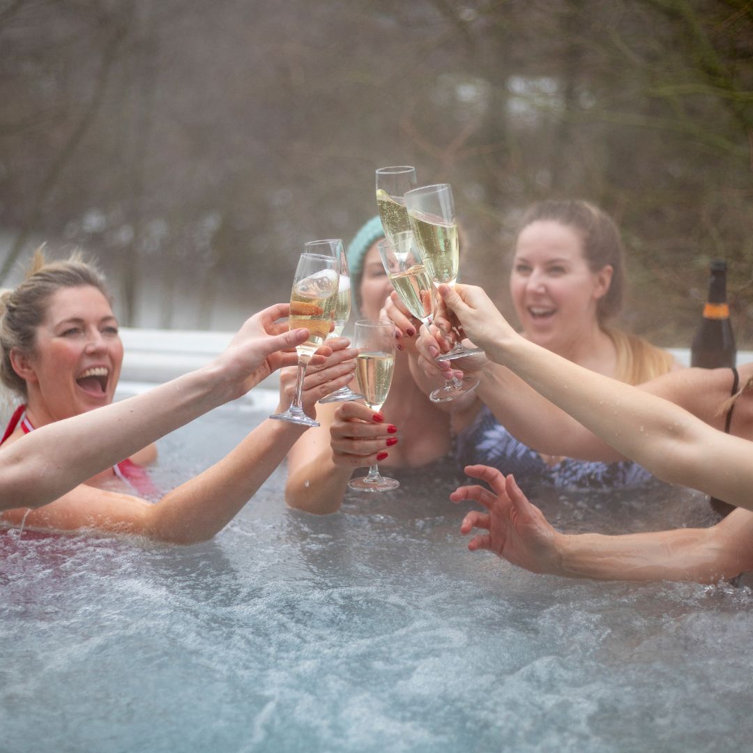 People toasting in hot tub