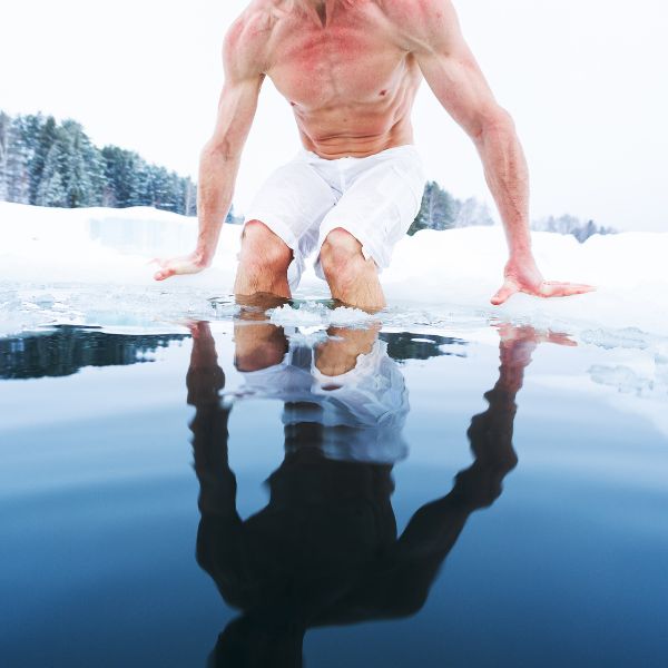 Man doing an ice plunge